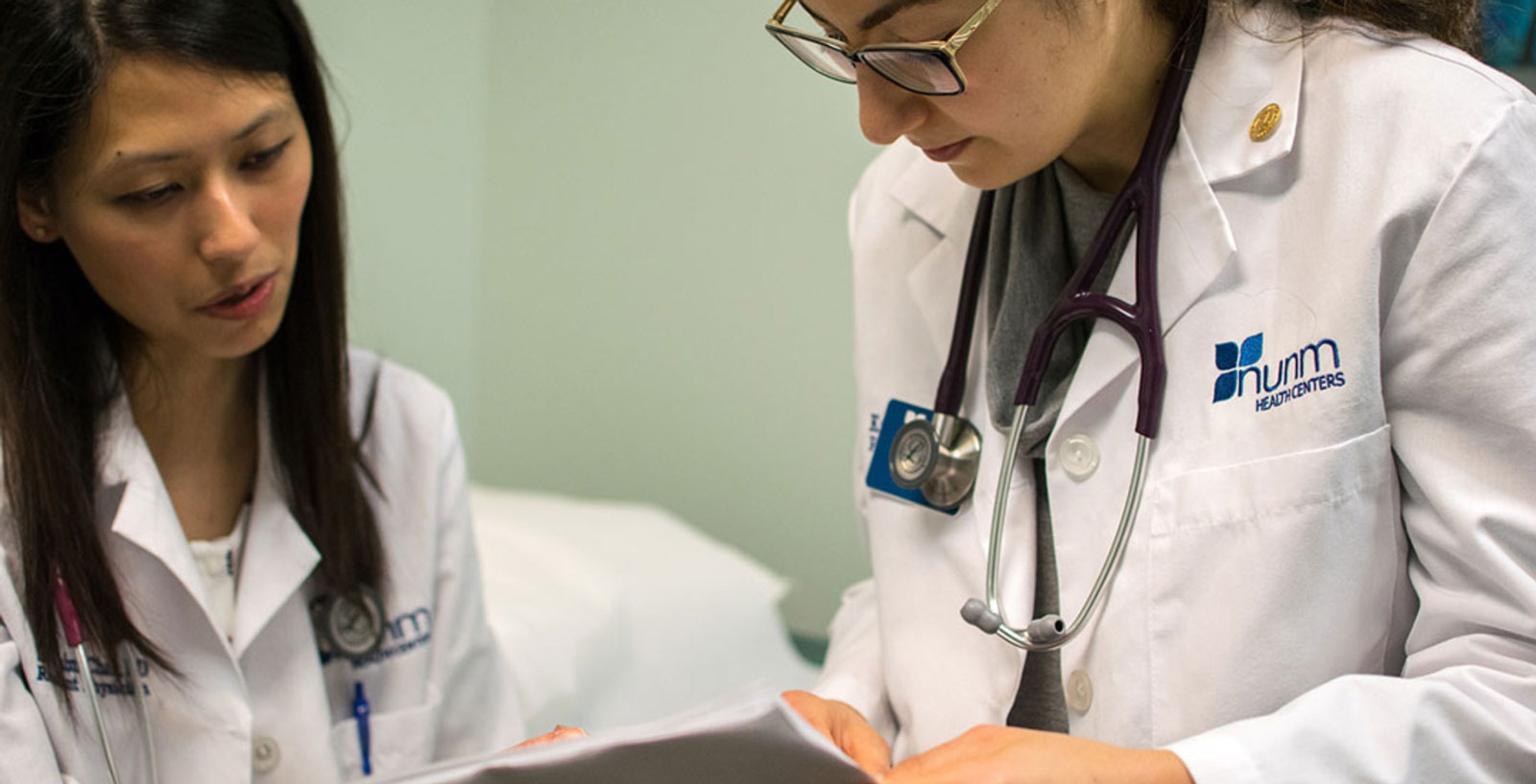 two doctors in white coats